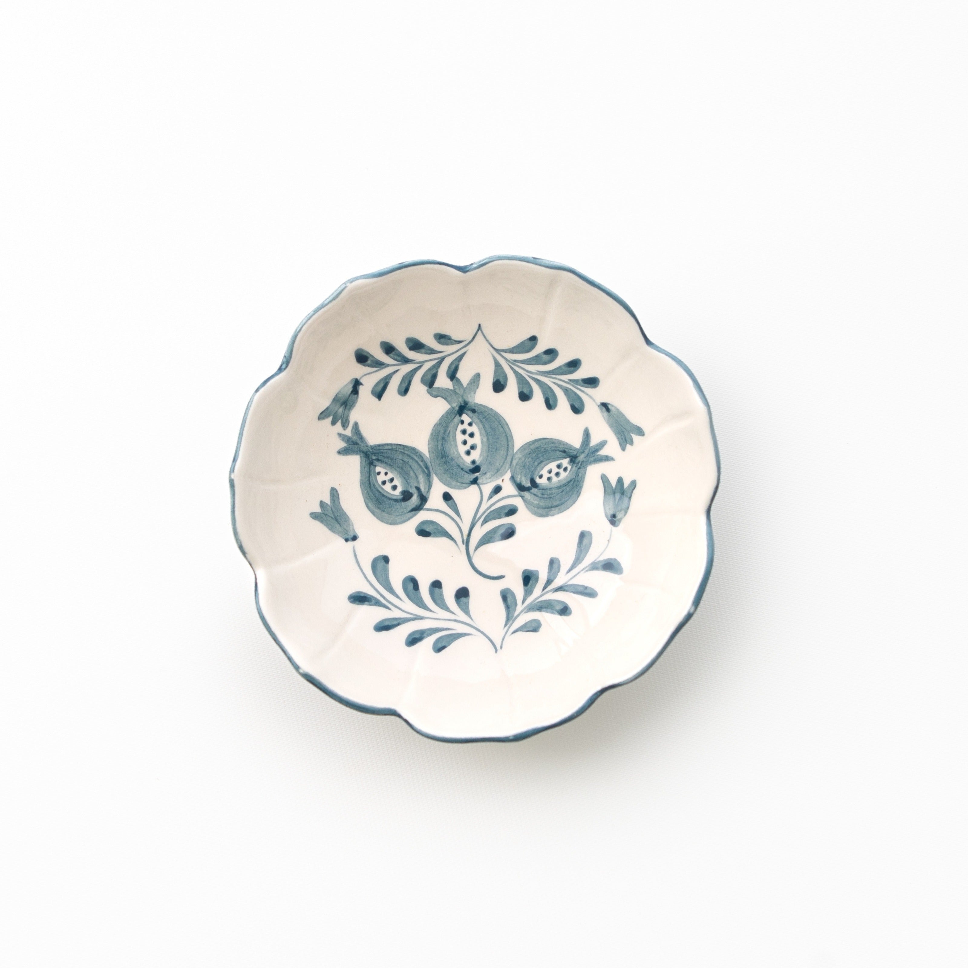 Ceramic bowl with blue floral design on a white background