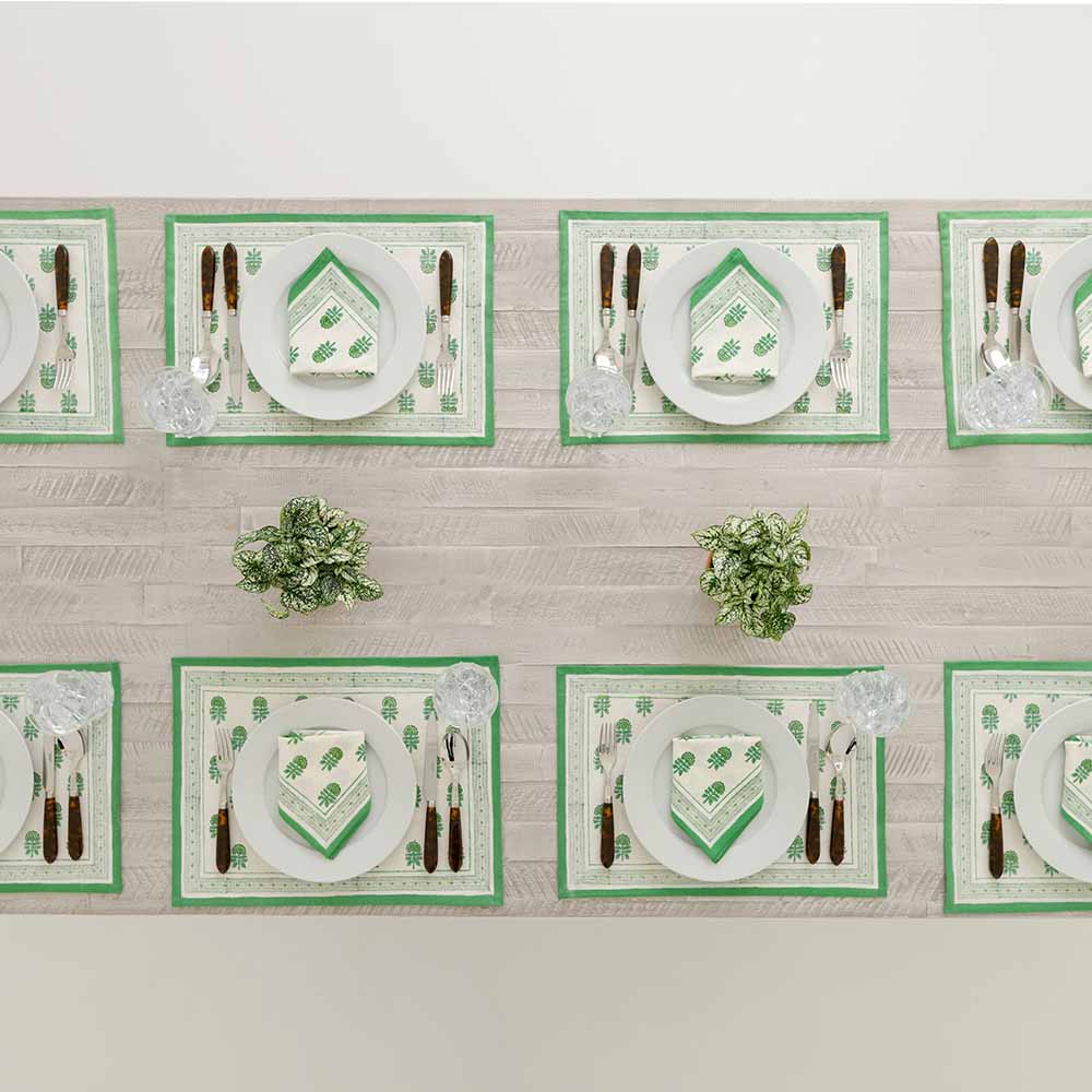 Placemat paired with matching napkin on a dinner table.