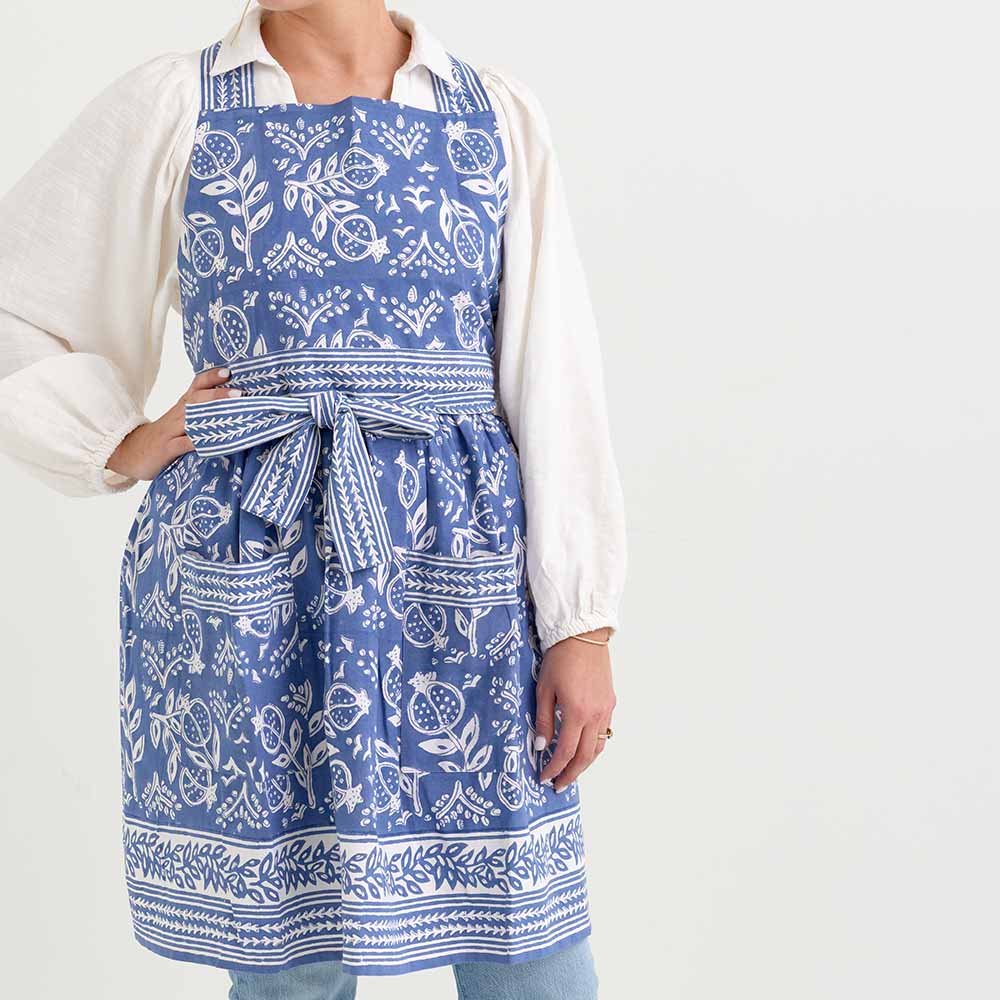 Hand painted pomegranate blue apron with ties.