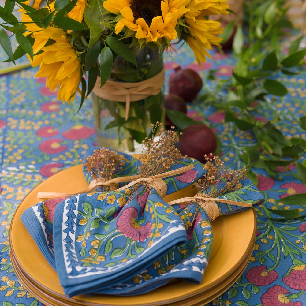 Cactus Flower Midnight Dark Blue & Magenta Floral napkins on yellow plates