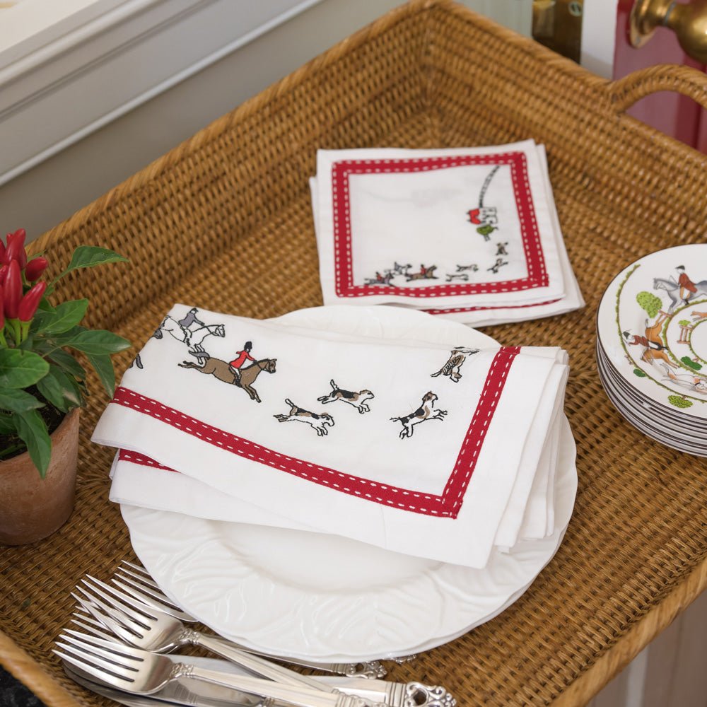 Embroidered Hunt Red Ribbon Napkins & Cocktail Napkins on wicker serving tray