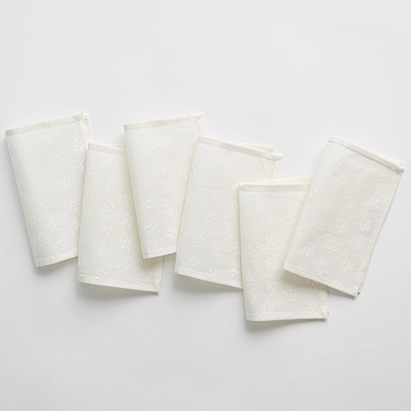 http://pomegranateinc.com/cdn/shop/products/Web-India-Hicks-White-on-White-Snowflake-Cocktail-Napkins_7697-146198_600x.jpg?v=1702181064