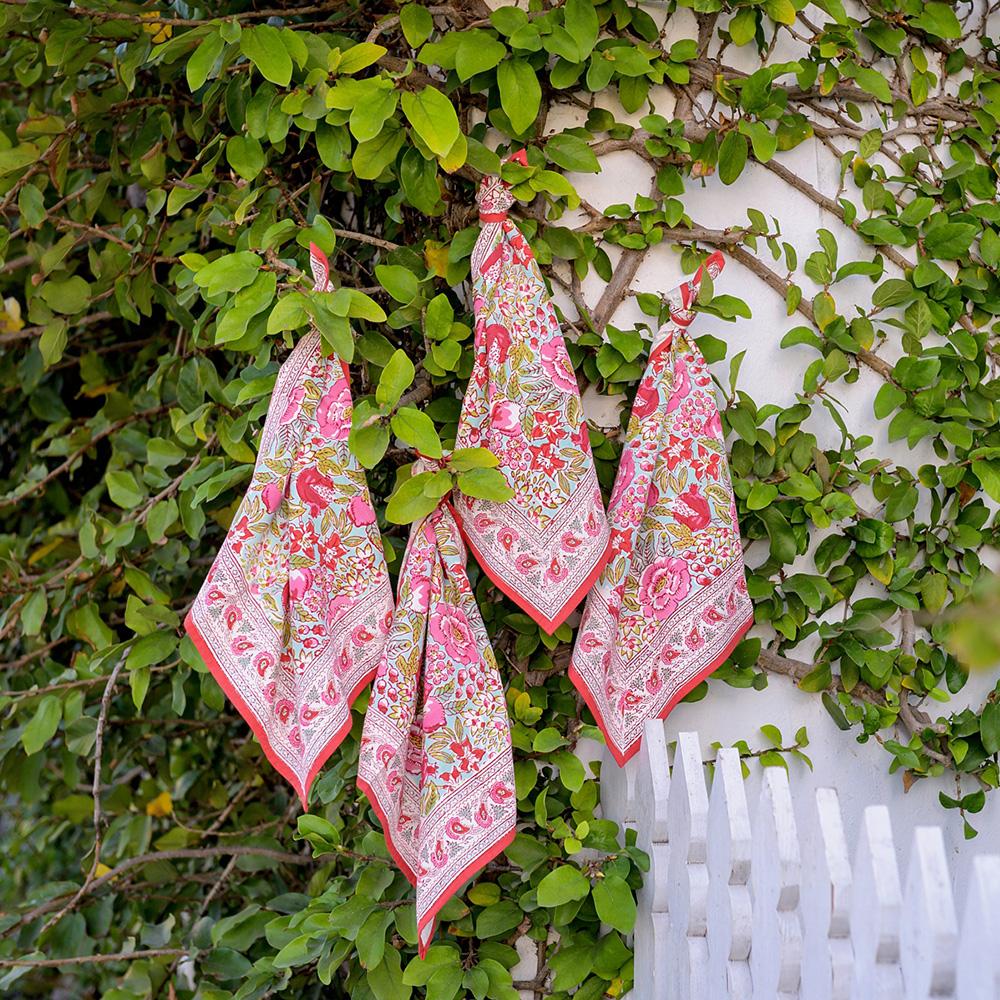 Wildflower Garden Napkin hanging on shrubb