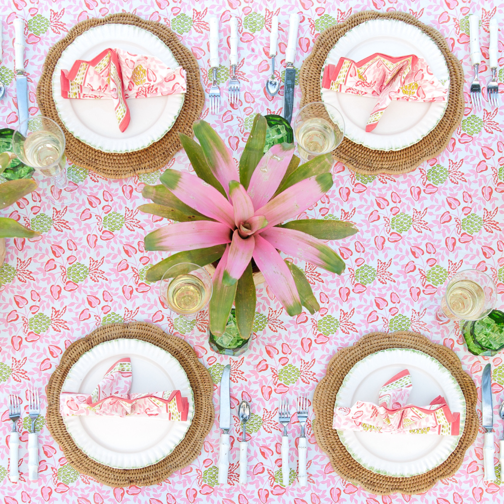 Decorative table setting with pink and green theme