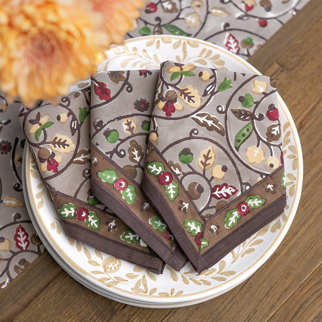 Decorative napkins with floral patterns on a plate