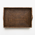 Woven brown tray on a white background
