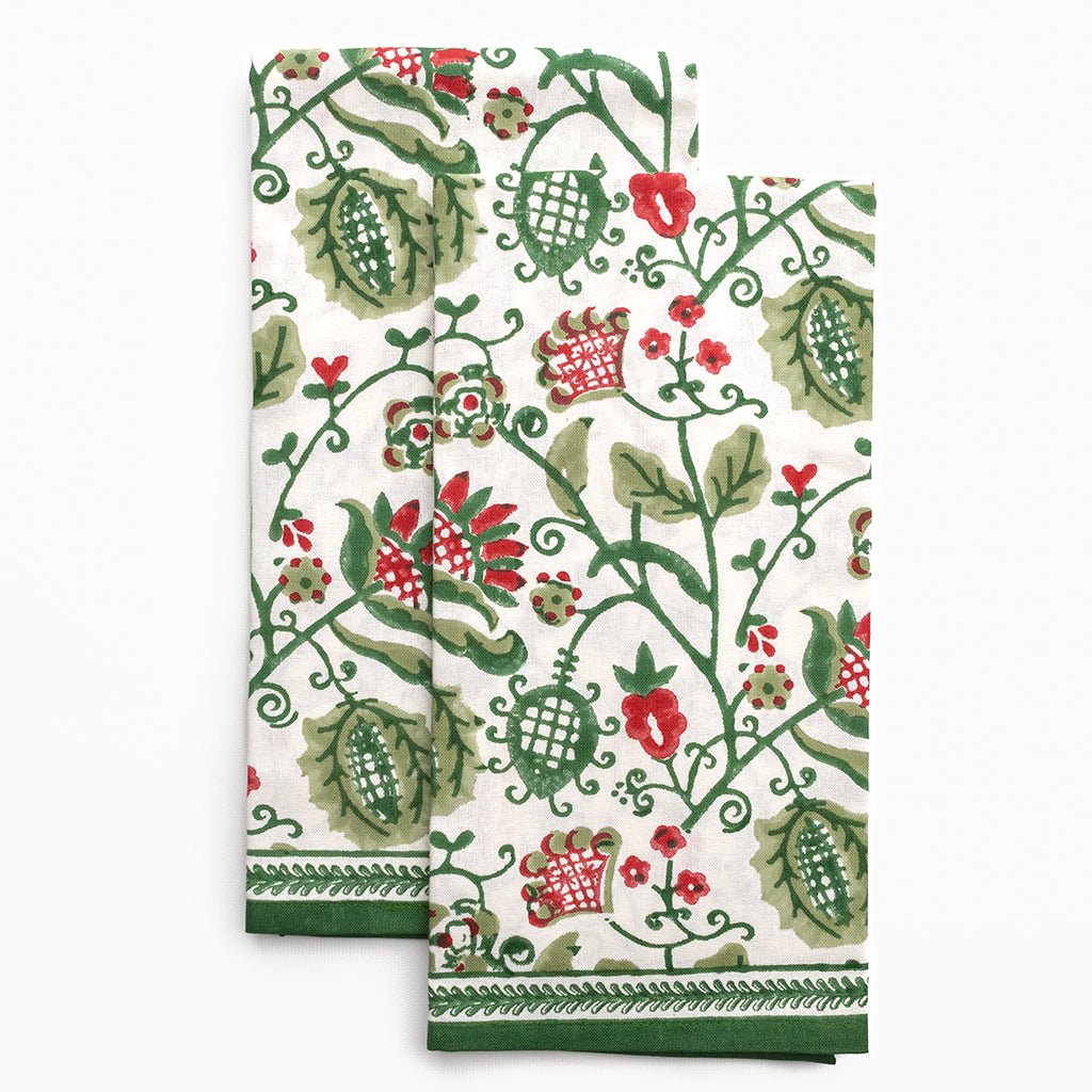 Set of two decorative towels with floral pattern on a white background