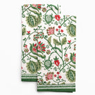 Set of two decorative towels with floral pattern on a white background