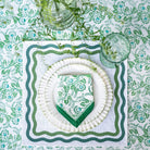 Hand block printed cotton napkin with green & white floral pattern