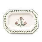 Decorative ceramic platter with floral design on a white background