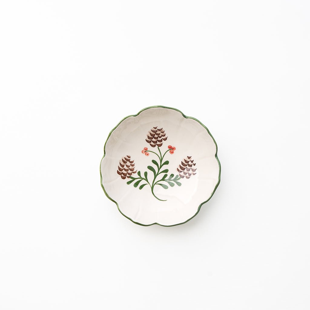 Decorative ceramic plate with floral design on a white background