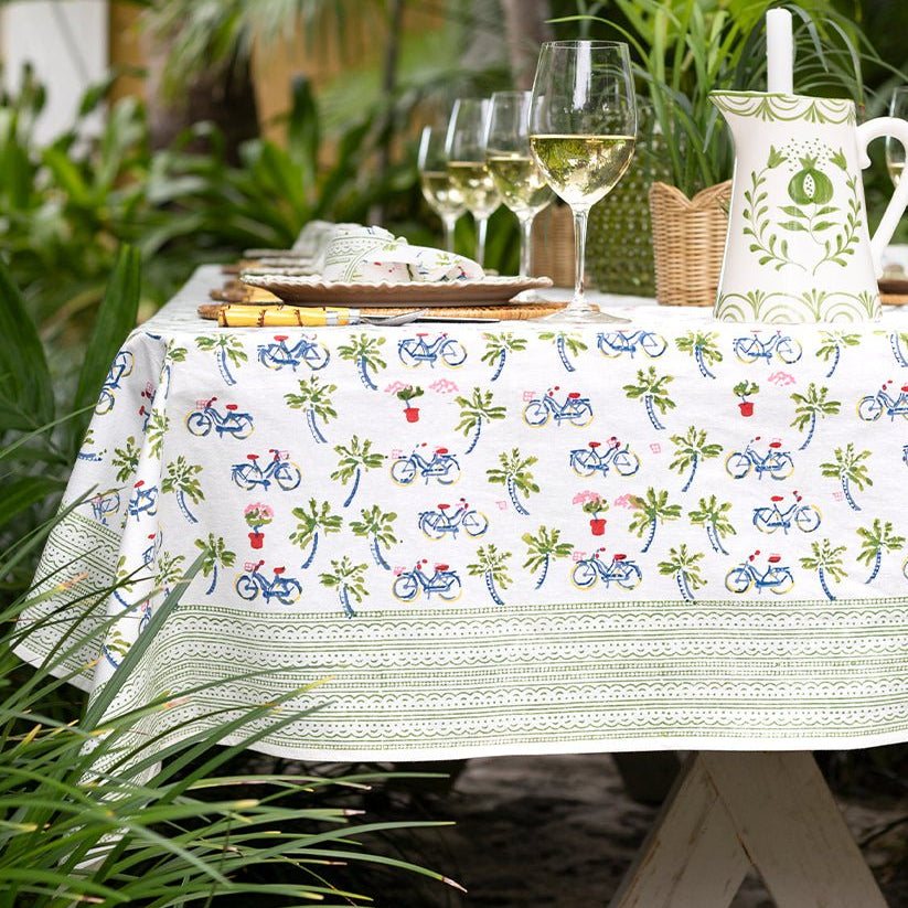 Tablecloth with bicycle pattern on a table outdoors