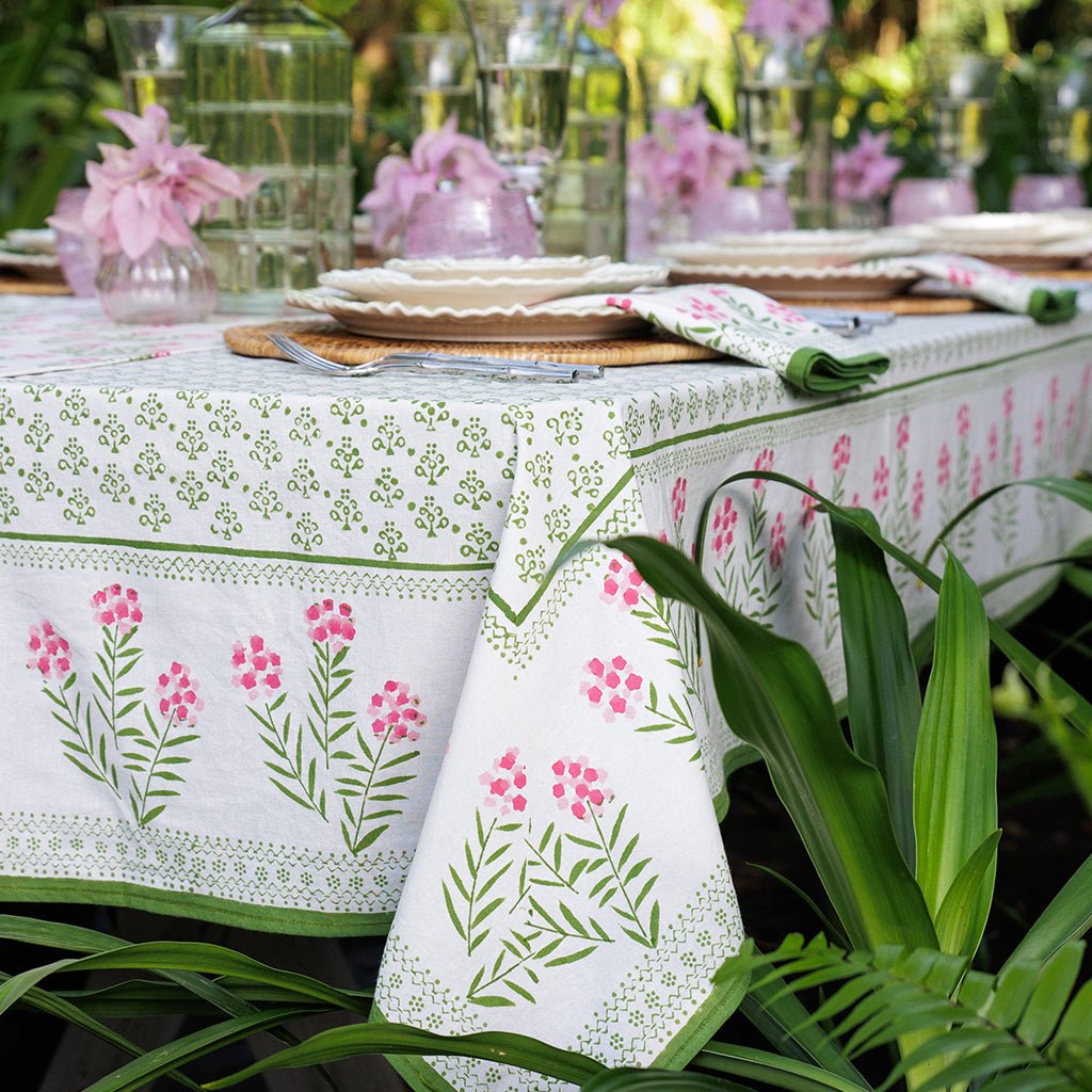 Table setting with a floral tablecloth in an outdoor setting