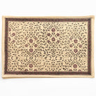 Decorative placemat with floral pattern on a white background