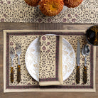 Decorative placemat with floral pattern on a wooden table