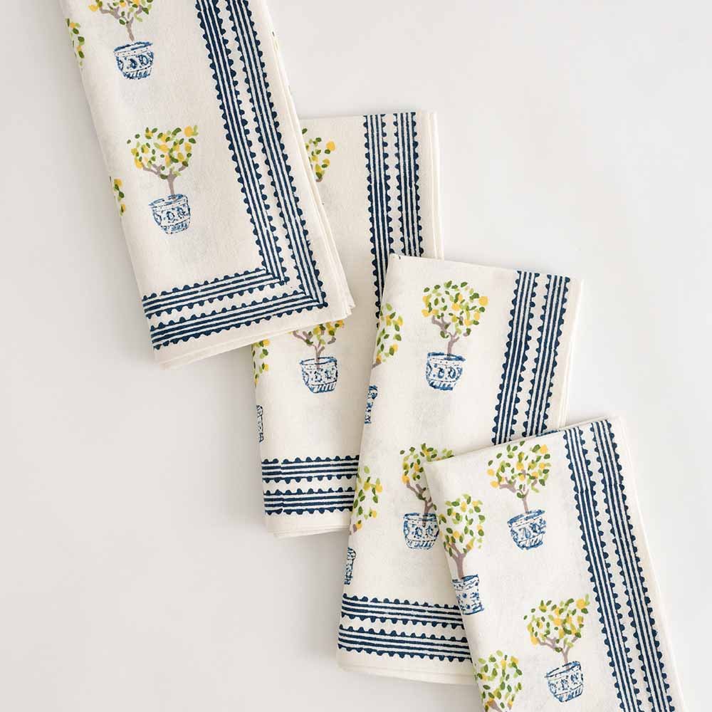 Lemon topiary napkin set of 4 with hues of blue, yellow, and green. 