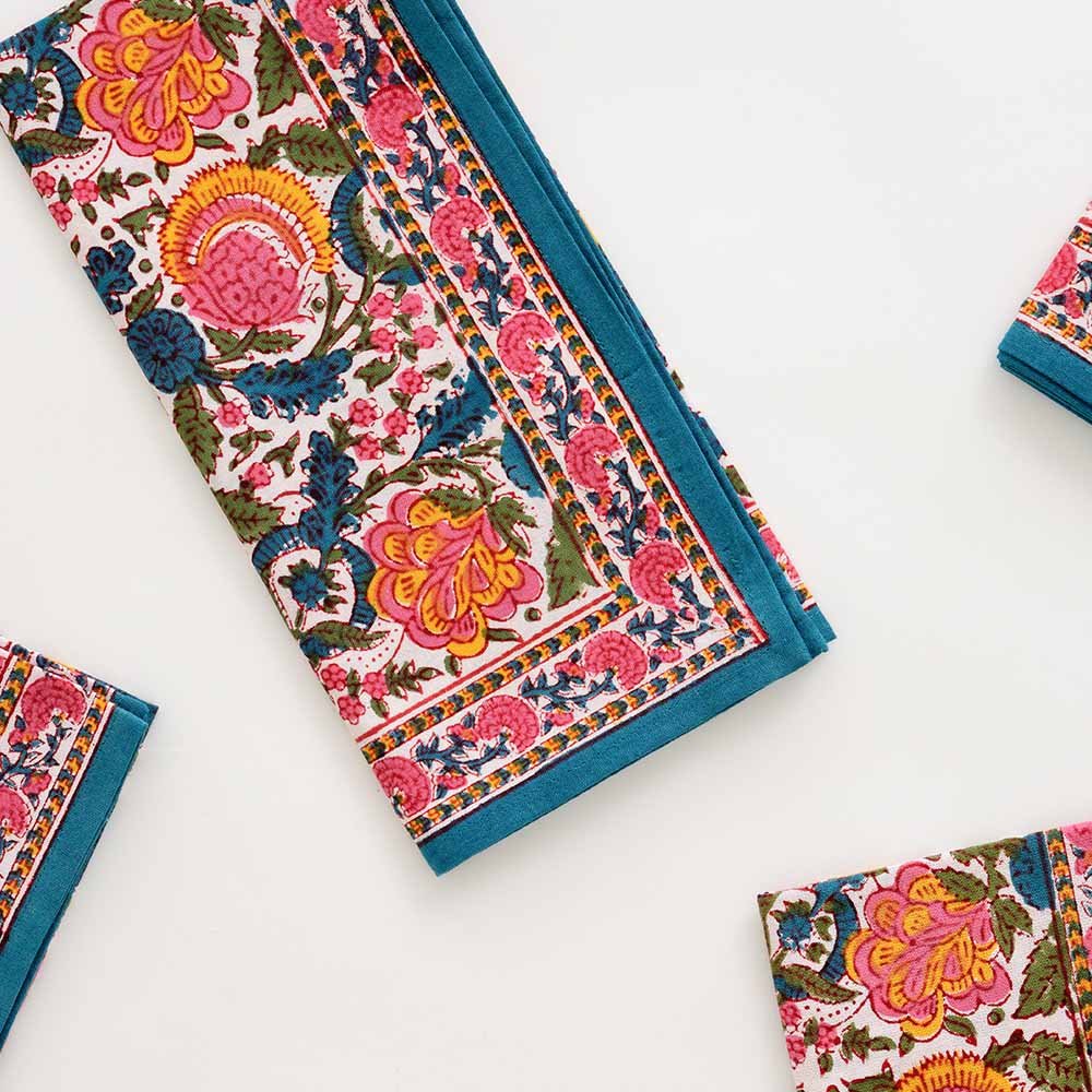 Close up of Jewel Blossom napkin block printed design. 