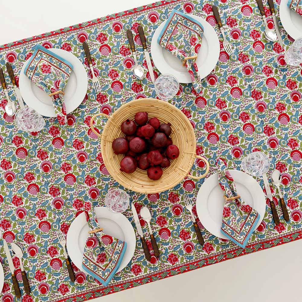 Floral printed cotton hand block tablecloth paired with matching napkin set. 