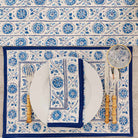Matching placemat, napkin, and table runner. 