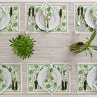 Elegant dinner table set with complementary greenery. 