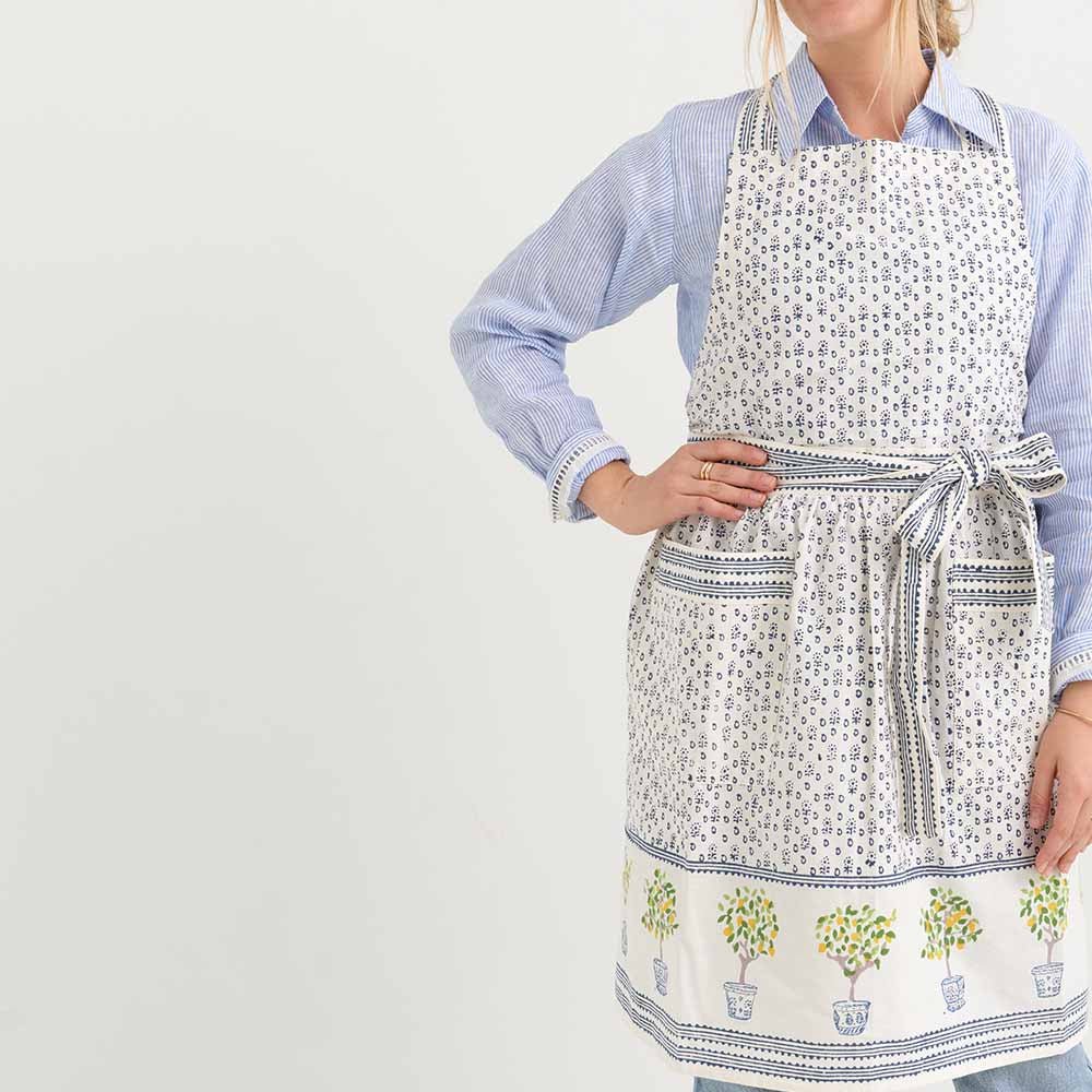Lemon Topiary apron with tie behind neck and around waist. 