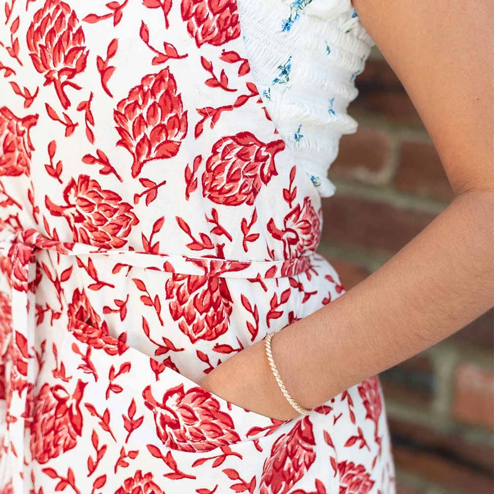 Close up of red and white hand painted details. 