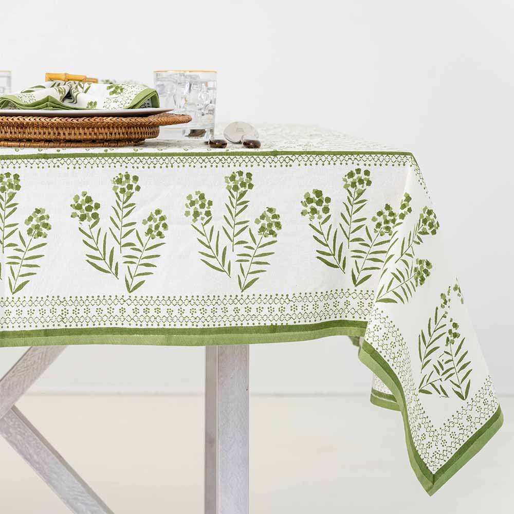 Fern green printed tablecloth detailed border. 