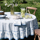 Round table with tea towel set and tablecloth. 