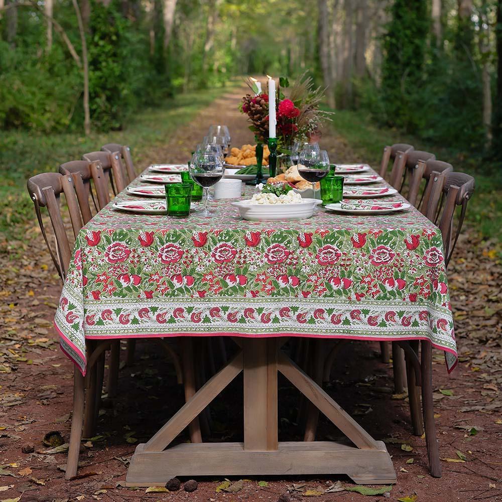 Autumn Orchard tablecloth on holiday themed table in the woods.