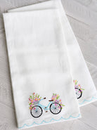 Blossom Bike Tea Towel on white towel