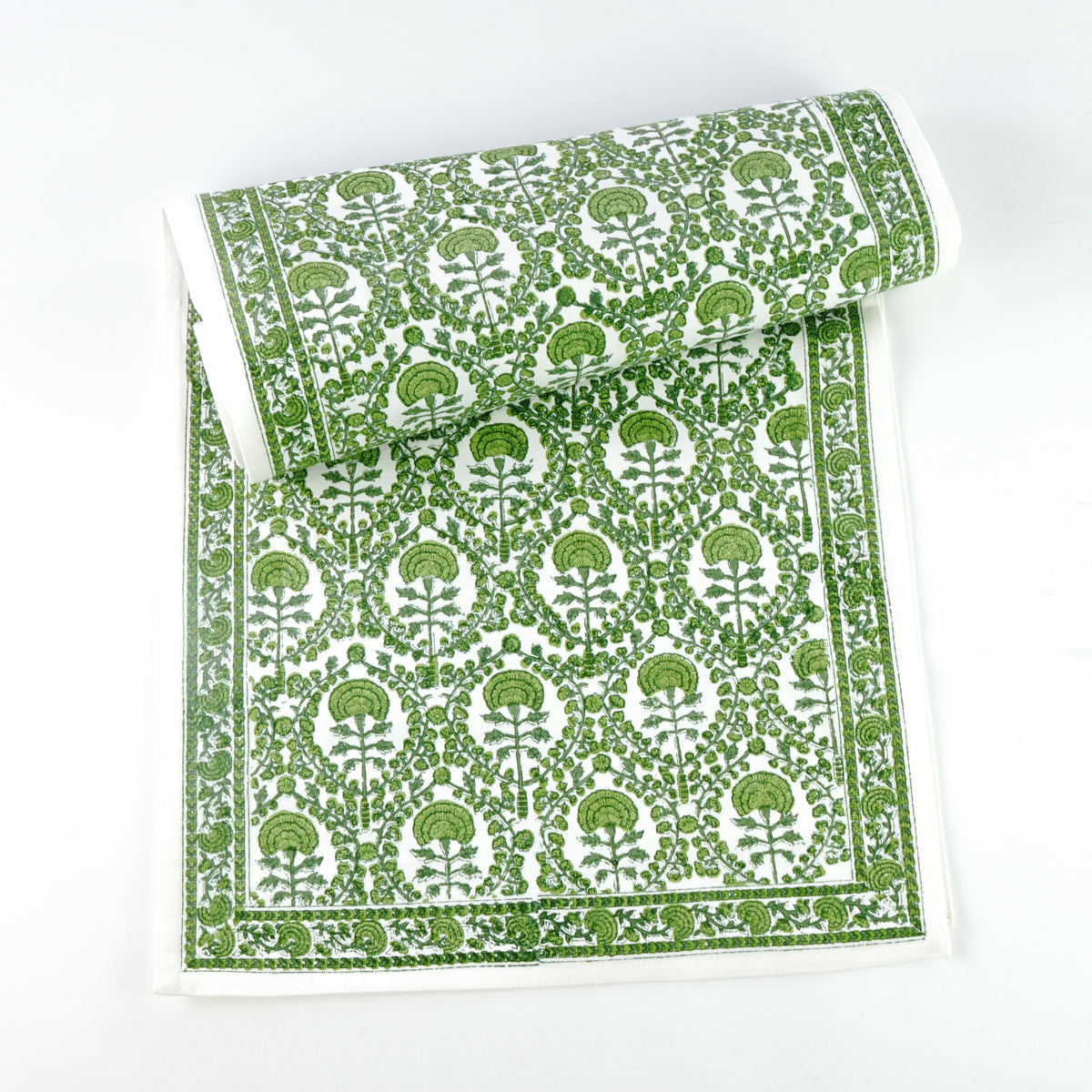 This 100% cotton table runner is a beautiful staple to have in your home and consists of rich and intricate green and white floral details. 