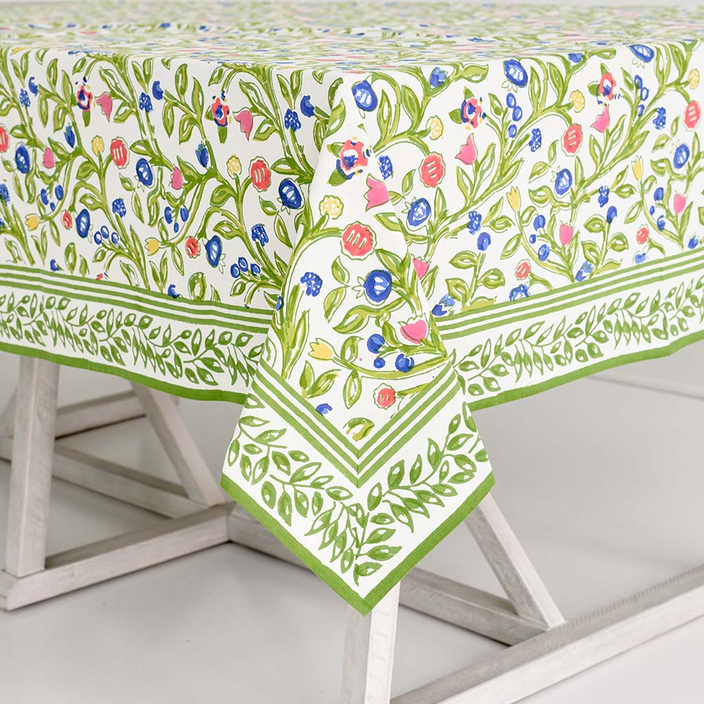 Spring patterned tablecloth of hand painted flowers. 