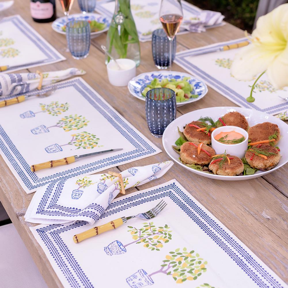 Lemon Topiary Placemats in blue and yellow.