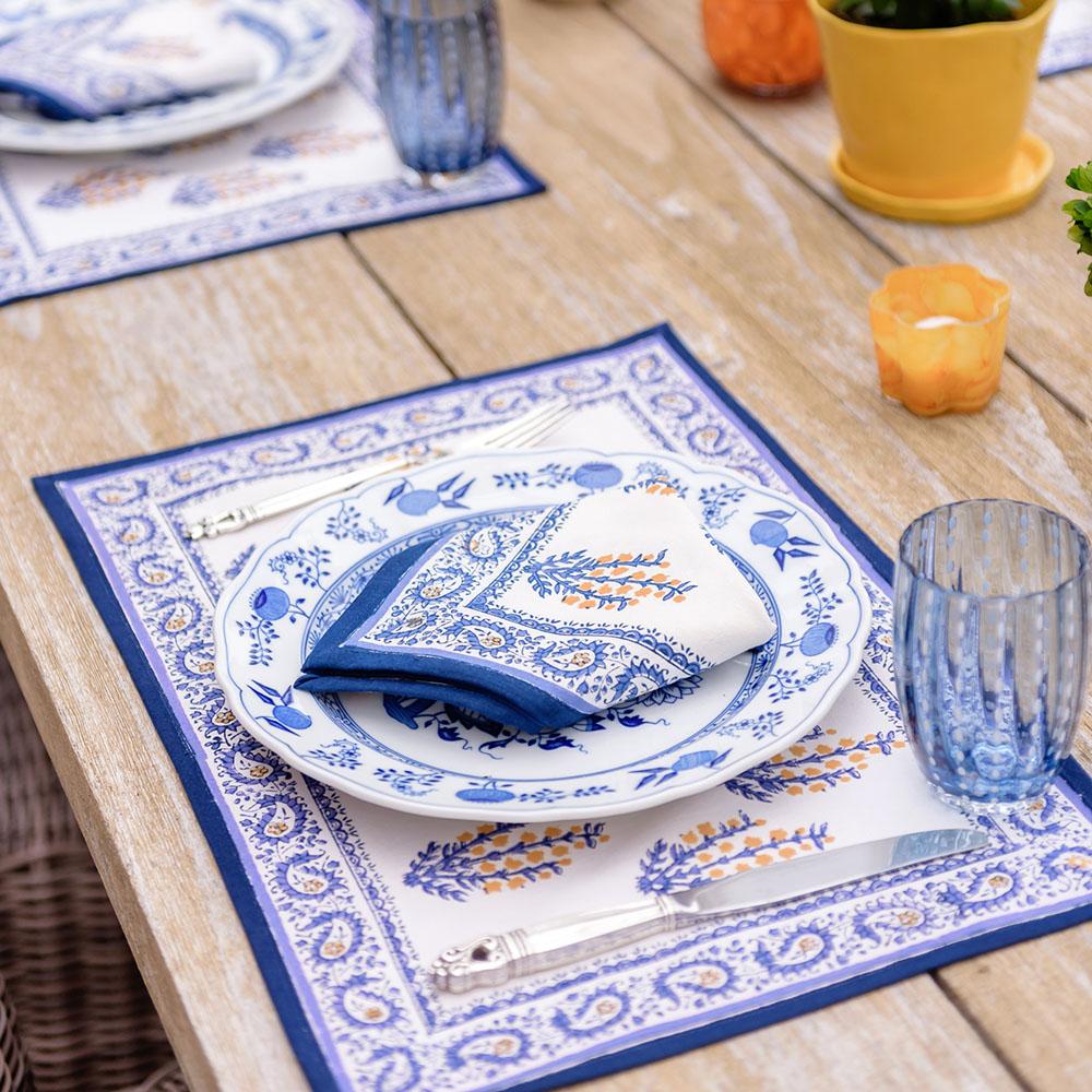 Sagar Blue & Marigold Placemat on wooden table