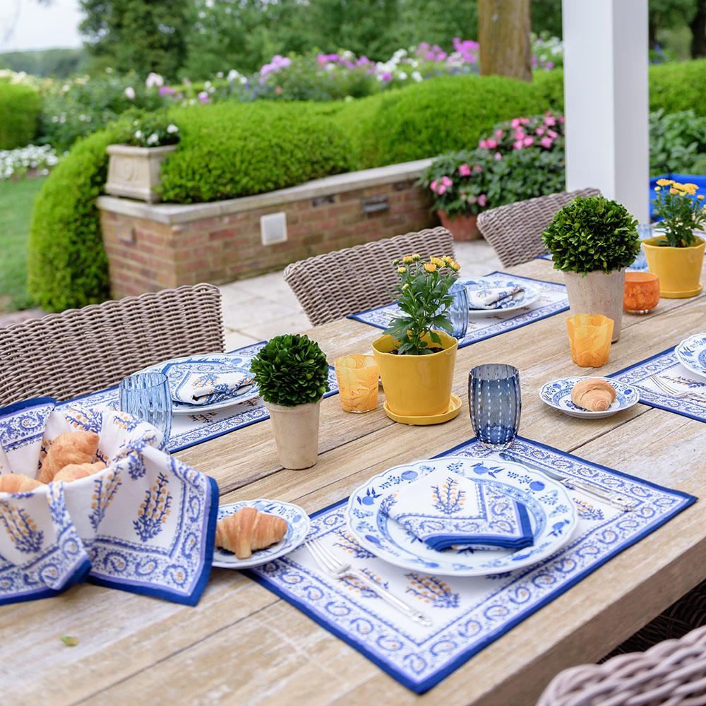 Sagar Blue & Marigold Placemat table setting in garden