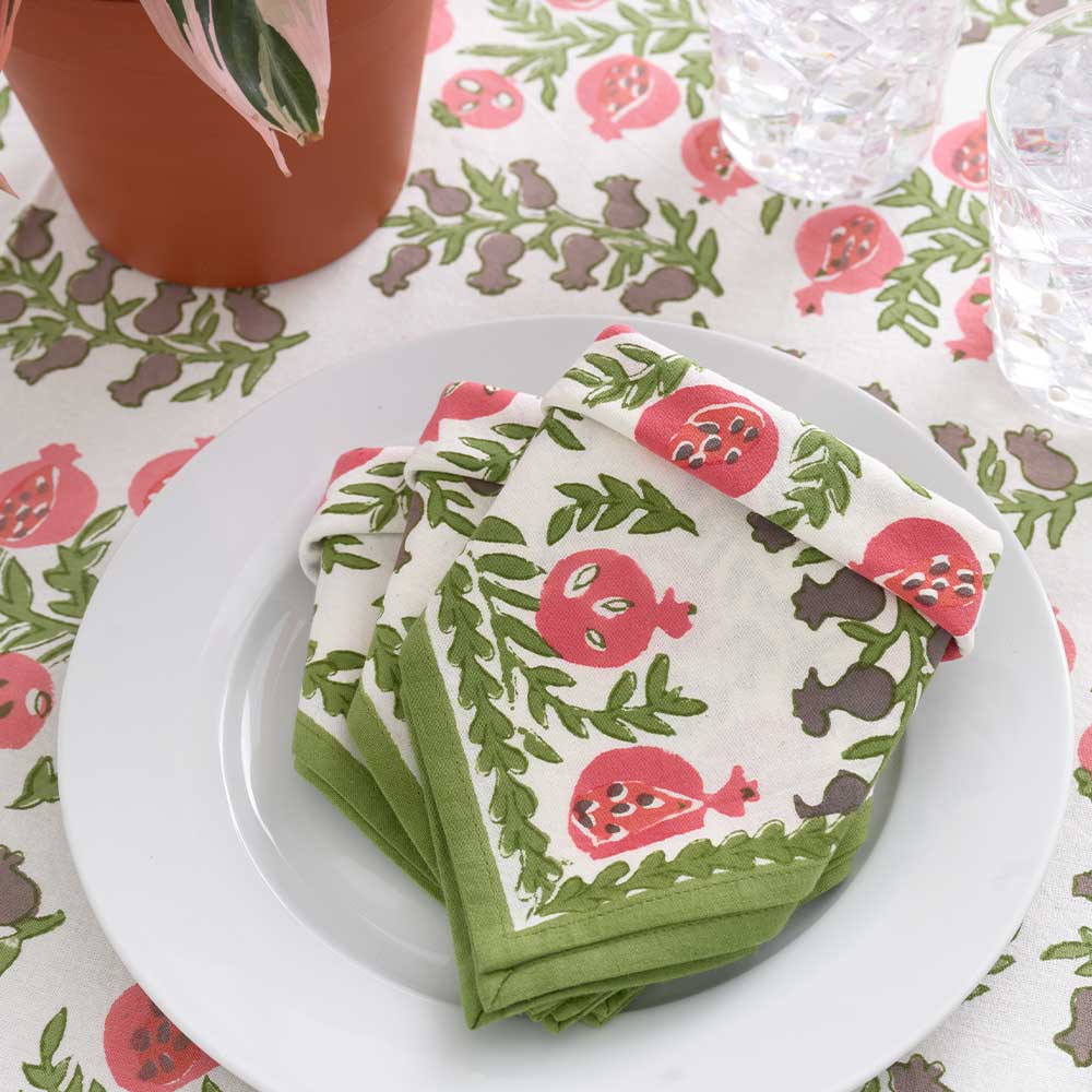 Folded napkins on white plate. 