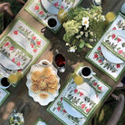 Pom Bells Fern & Poppy napkin with matching placemat. 