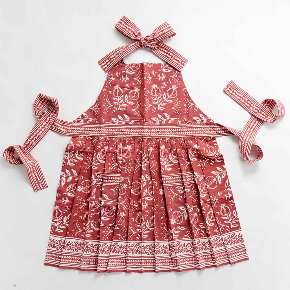 Pomegranate Poppy Apron with adjustable ties and pockets. 