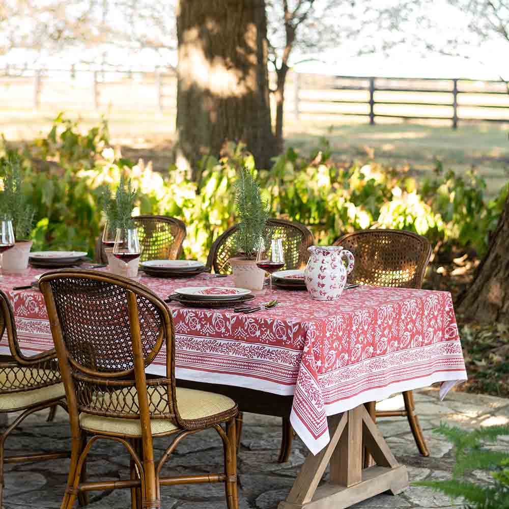 Outdoor table set with Pomegranate Poppy tablecloth. 