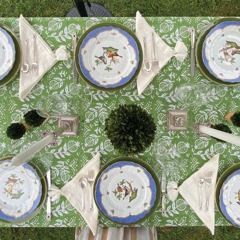 Overhead shot of Pomegranate Green tablecloth. 