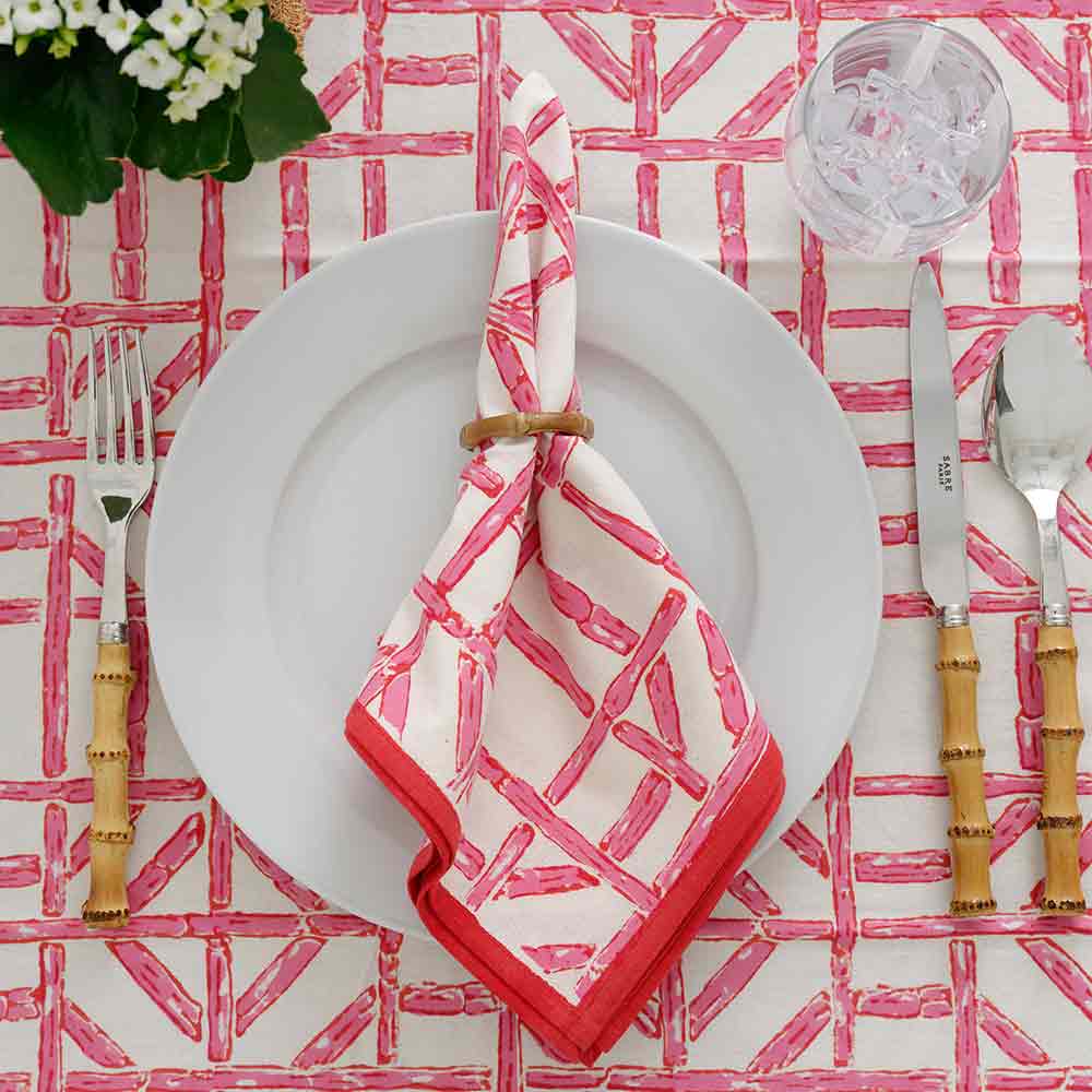 Rose Bamboo tablecloth and matching napkin in napkin ring. 