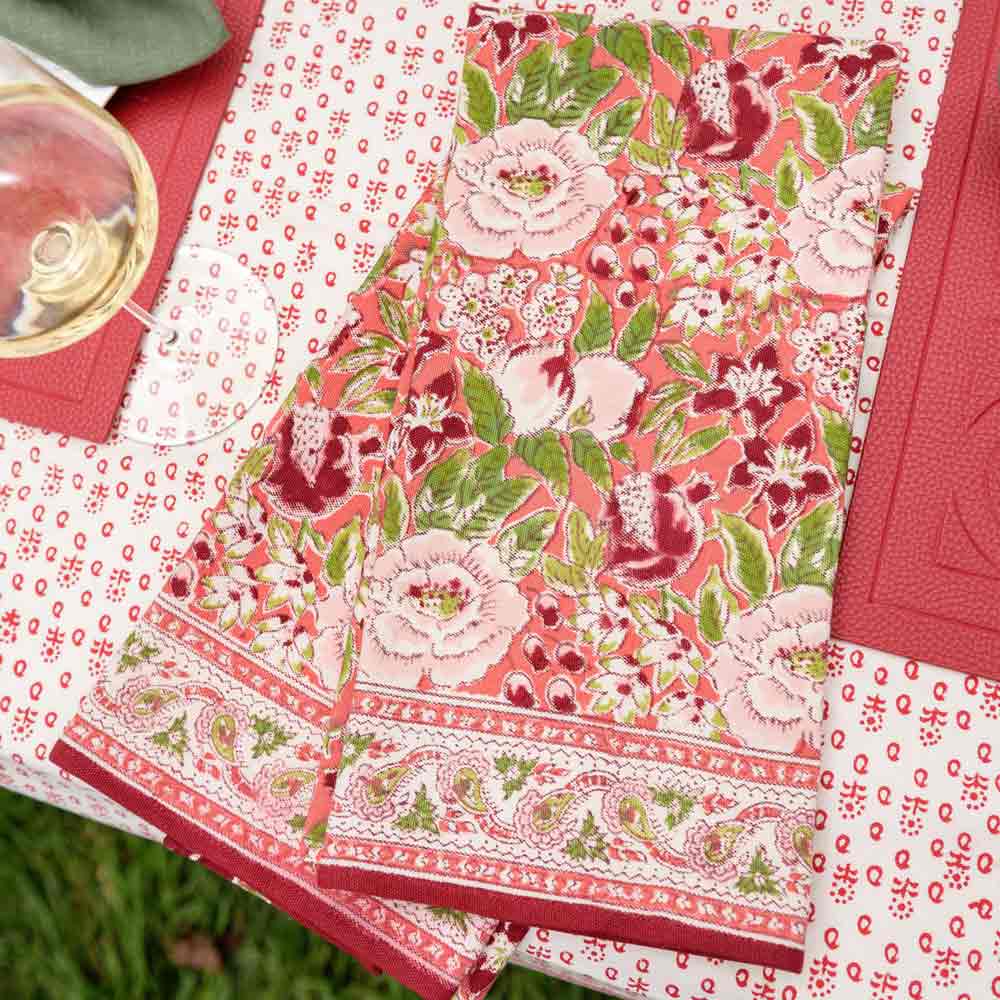 Spice Route Garnet Red Tea Towels with coordinating tablecloth and placemats.