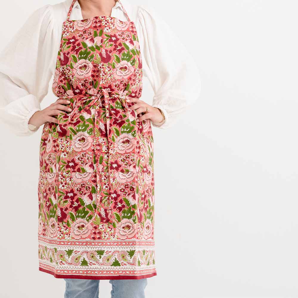 Spice Route Garnet apron with adjustable ties and pockets. 