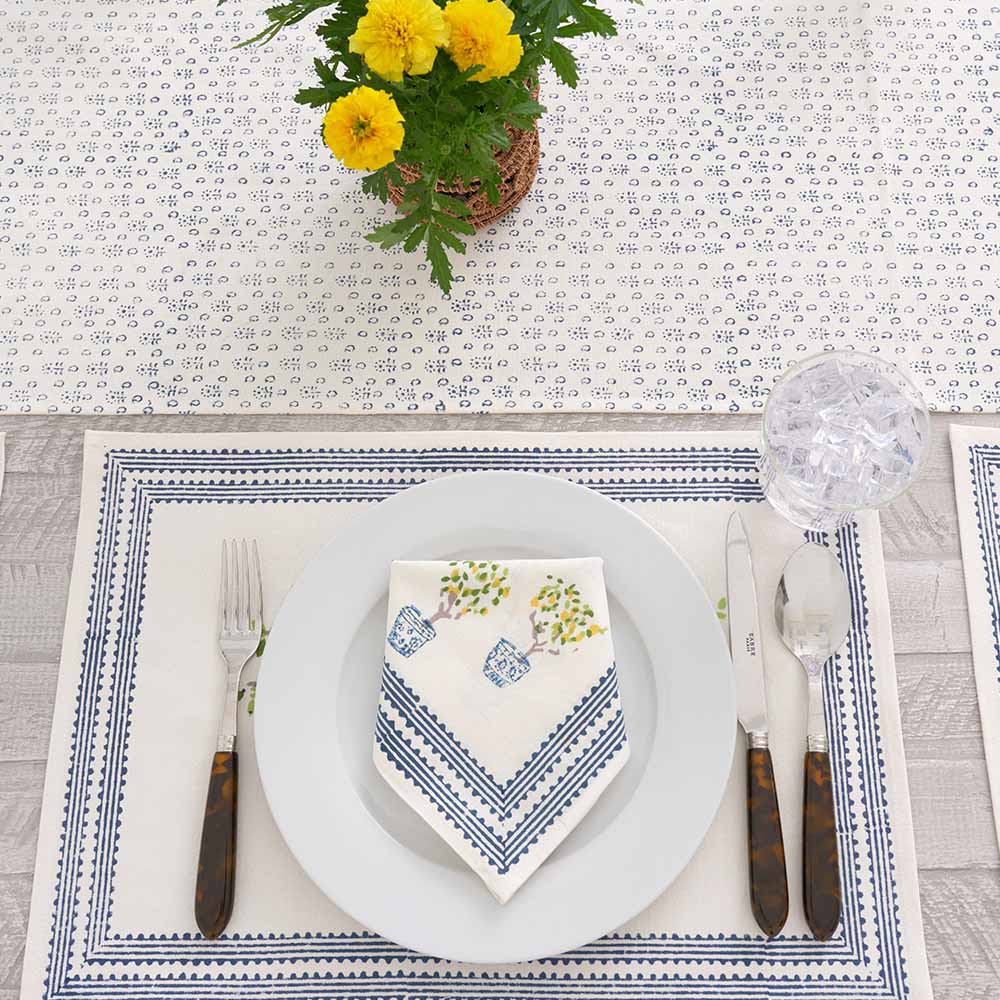 Table runner with matching placemat and napkin. 