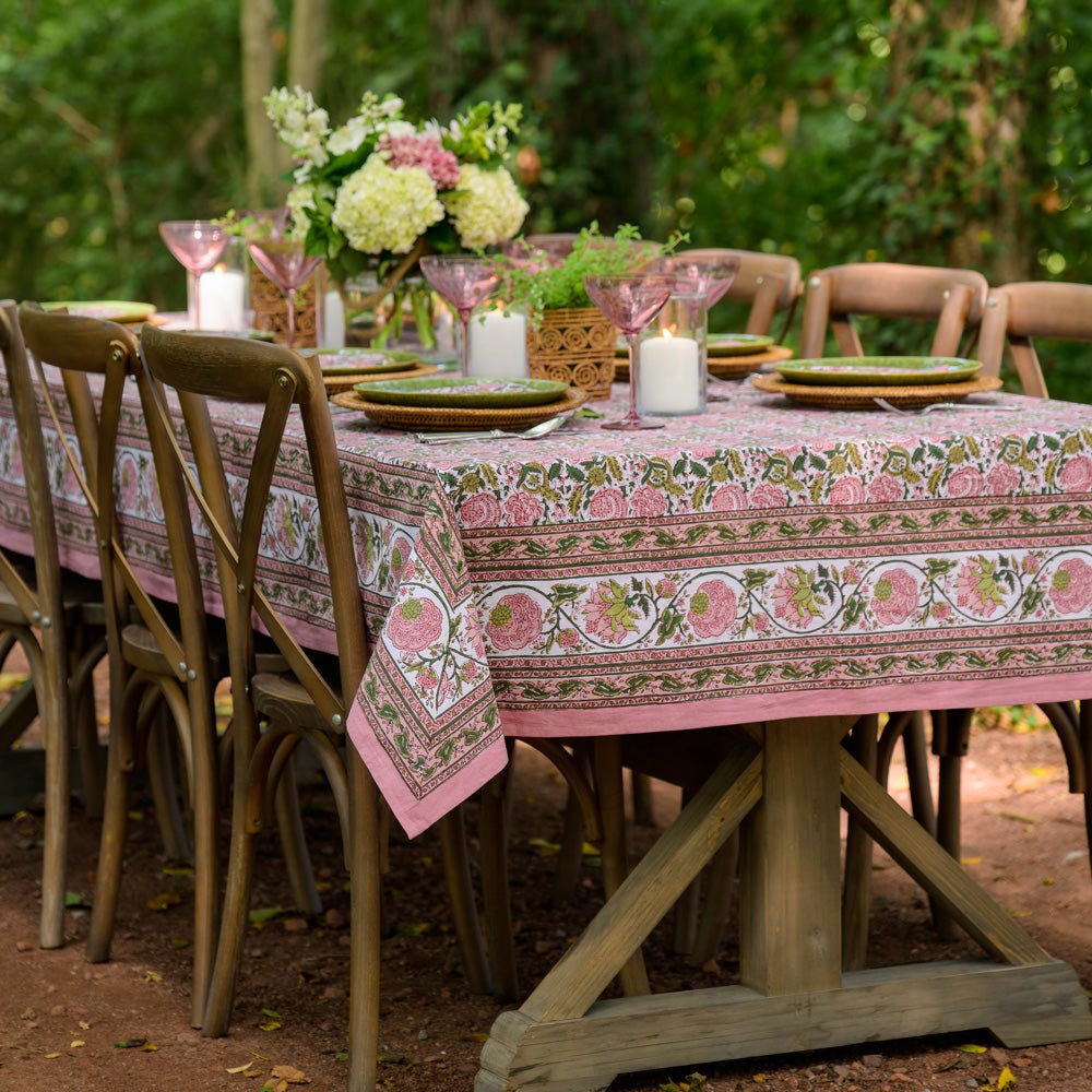 outdoor table with bohemian floral moss & mauve tablecloth