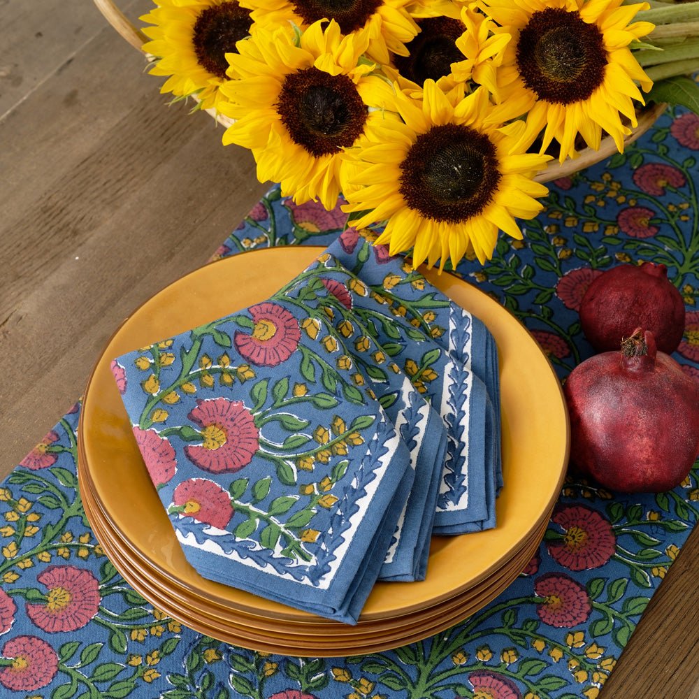 Cactus Flower Midnight Dark Blue & Magenta Floral  napkins on yellow plate with matching table runner and sunflowers
