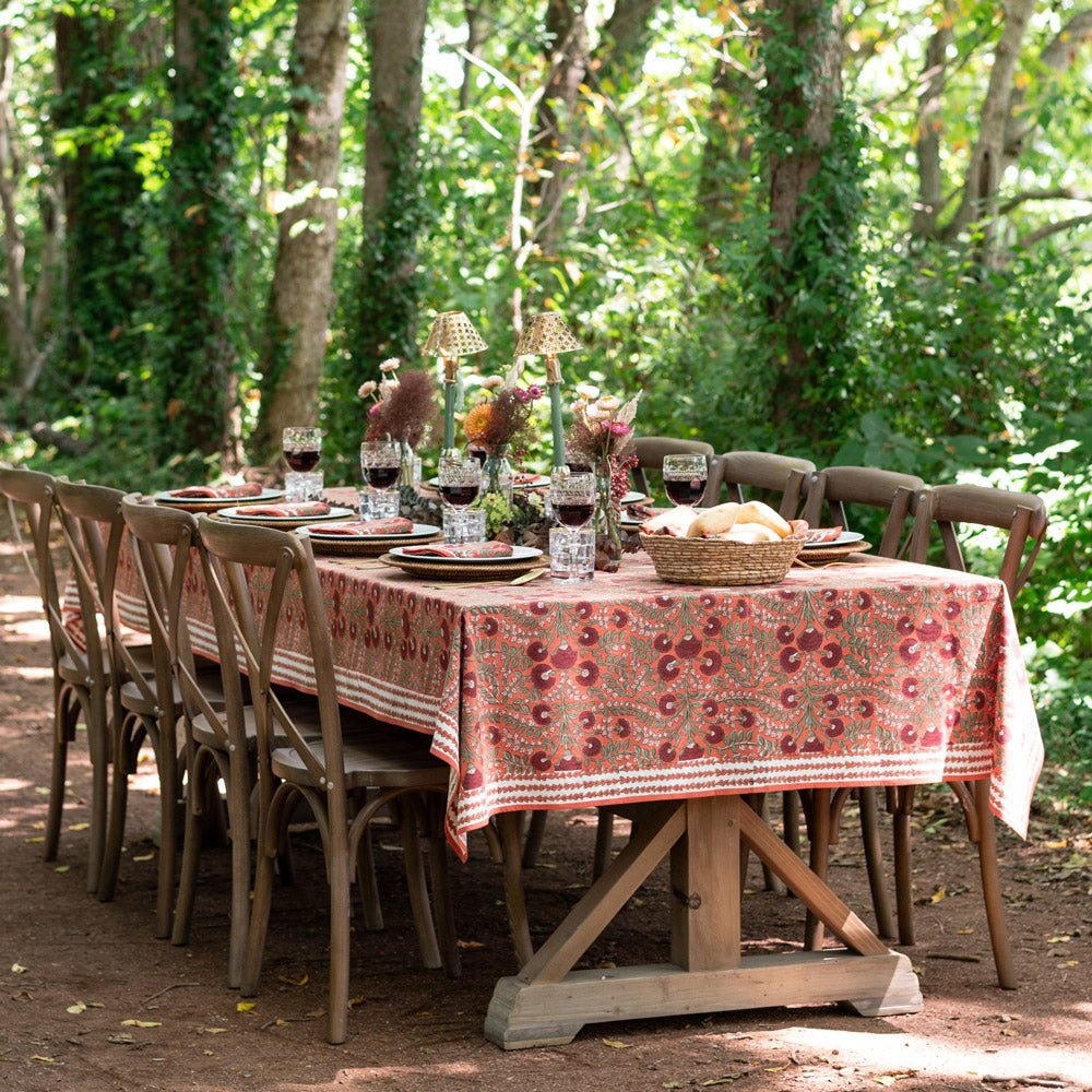 outdoor table with cactus flower red tablecloth