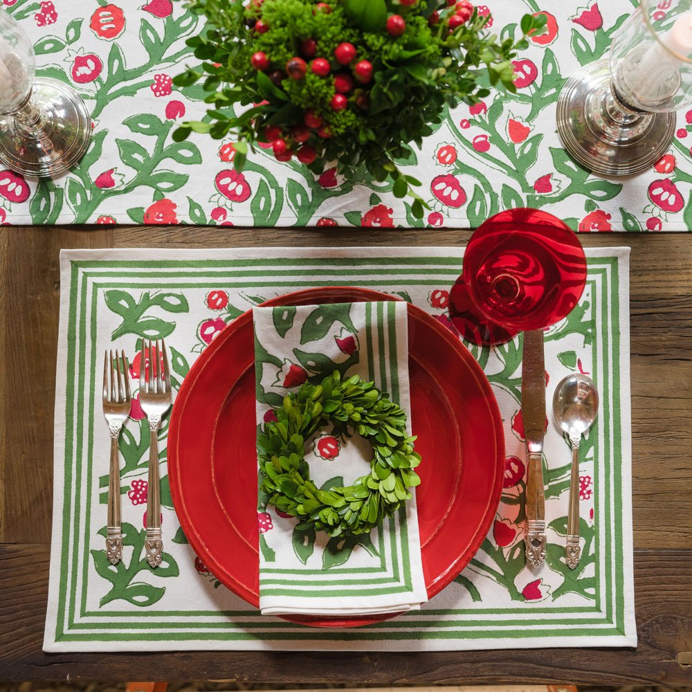 emma red &amp; green napkin on red plate with mini wreath and matching placemat