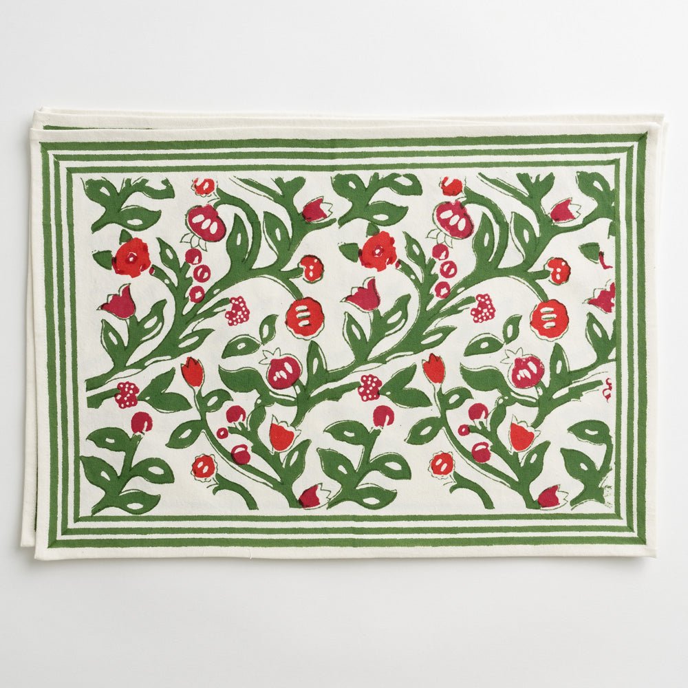 emma red & green napkin on red plate with mini wreath and matching placemat