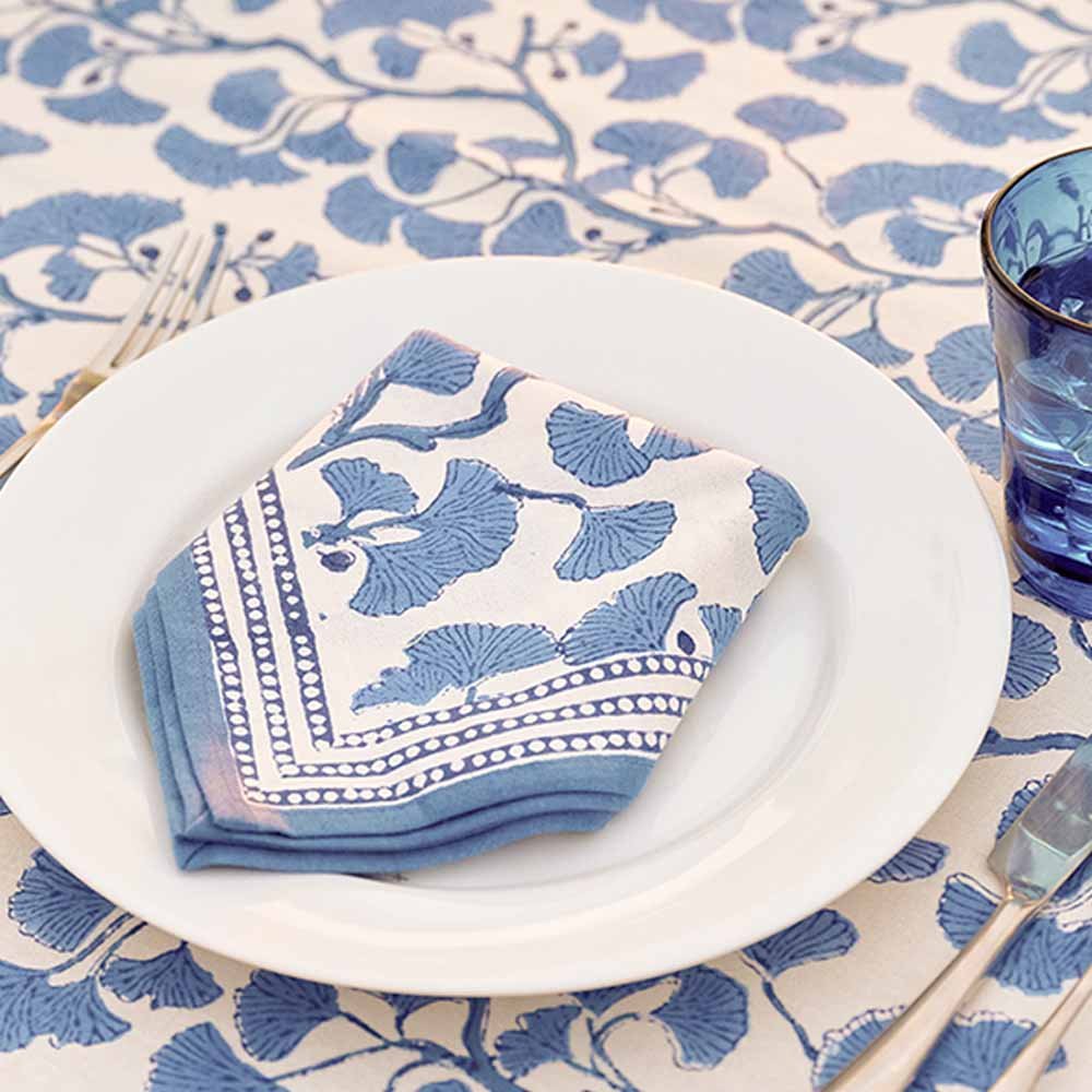 Ginkgo Blue napkin on dinner plate with matching tablecloth. 